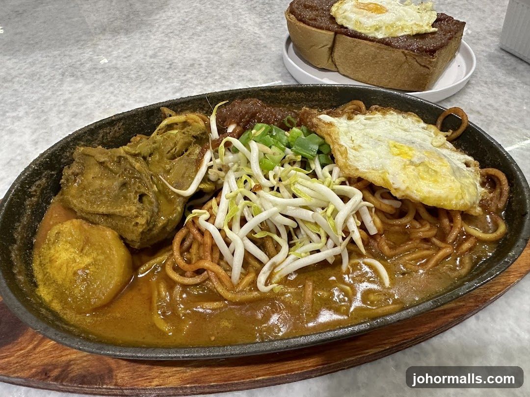 Sizzling Noodles with Fried Egg and Toast