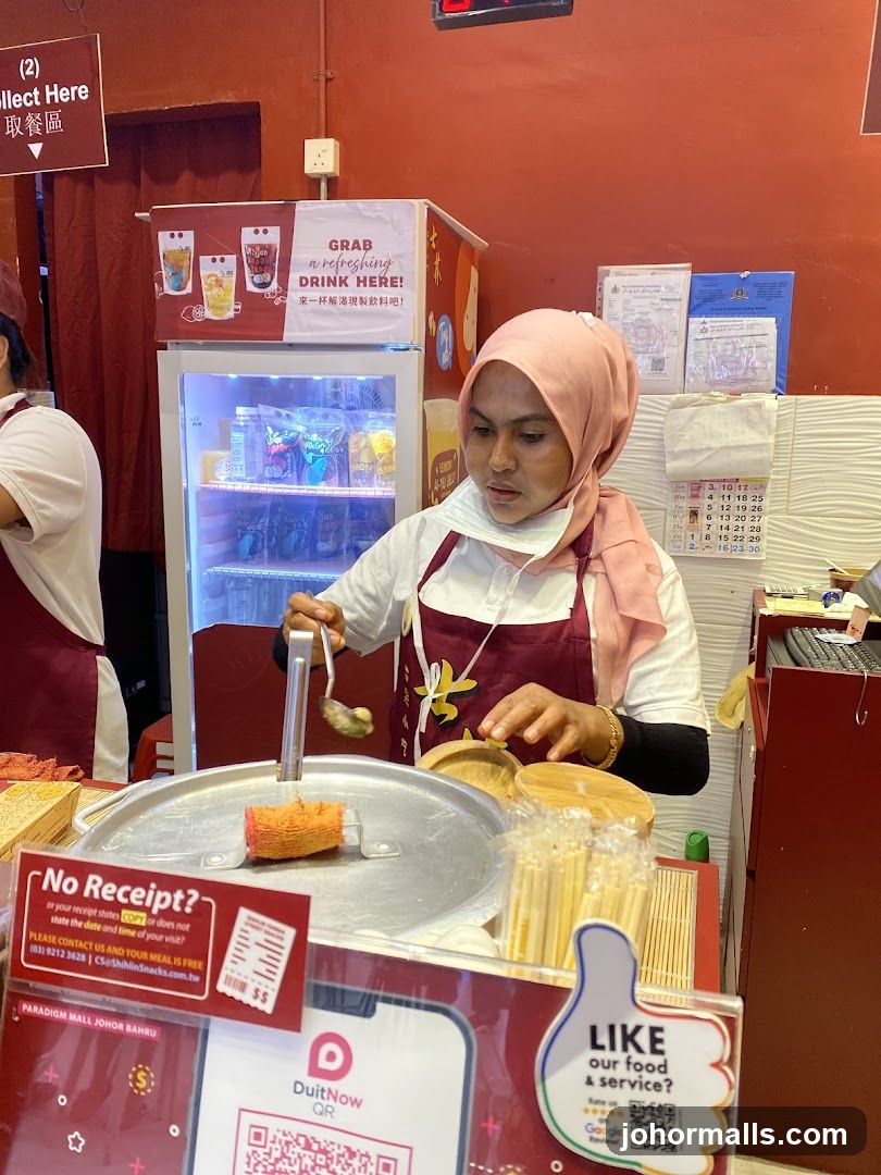 Food Stall Staff Preparing Food