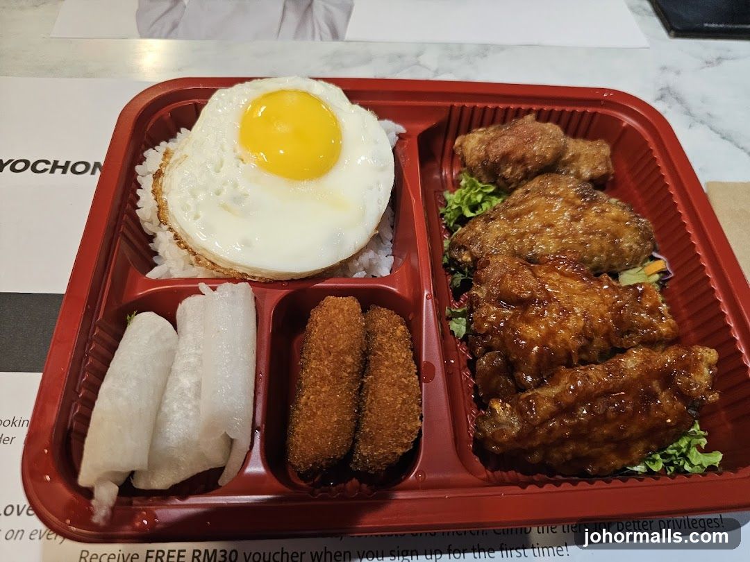 Bento Box with Fried Egg and Chicken Wings