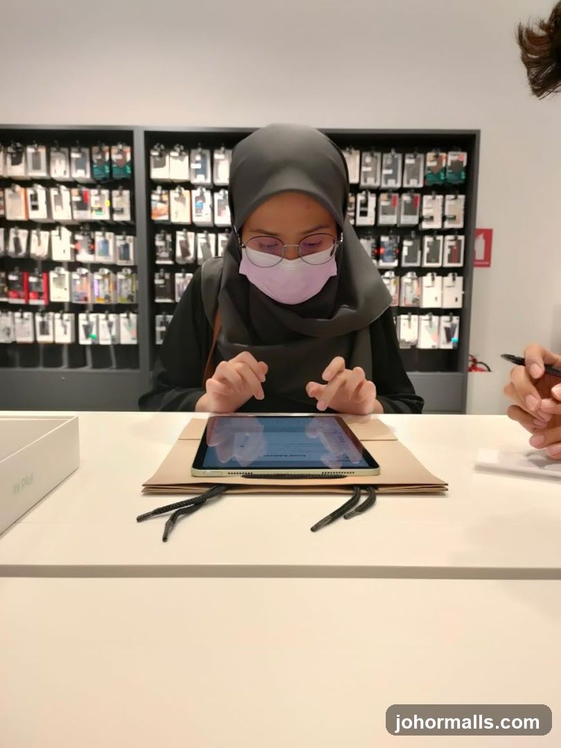Customer using a tablet in a store