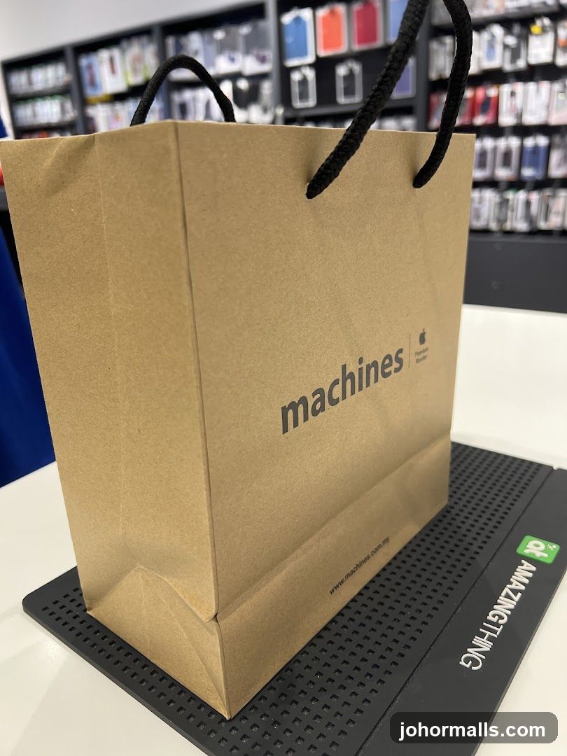 Brown paper shopping bag with logo