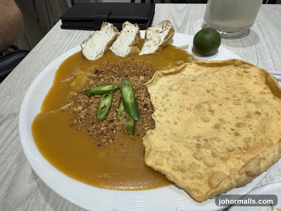 Plate of Food with Tofu and Crispy Cracker