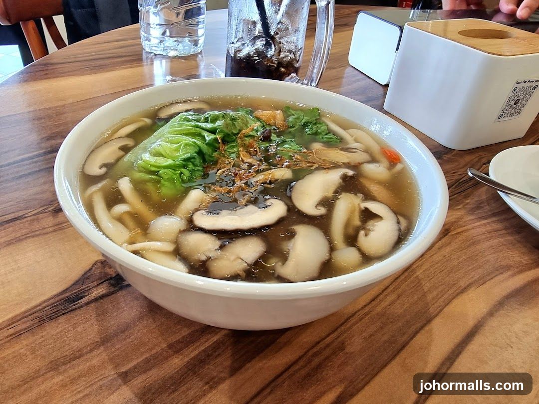 Bowl of Noodles with Mushrooms and Greens