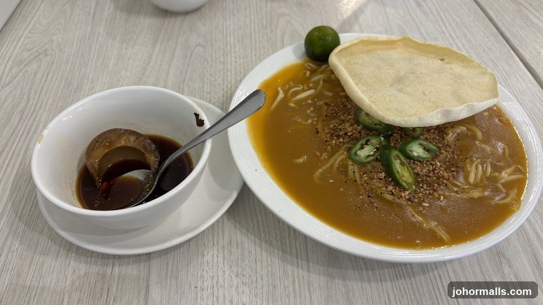 Noodle Dish with Side of Sauce
