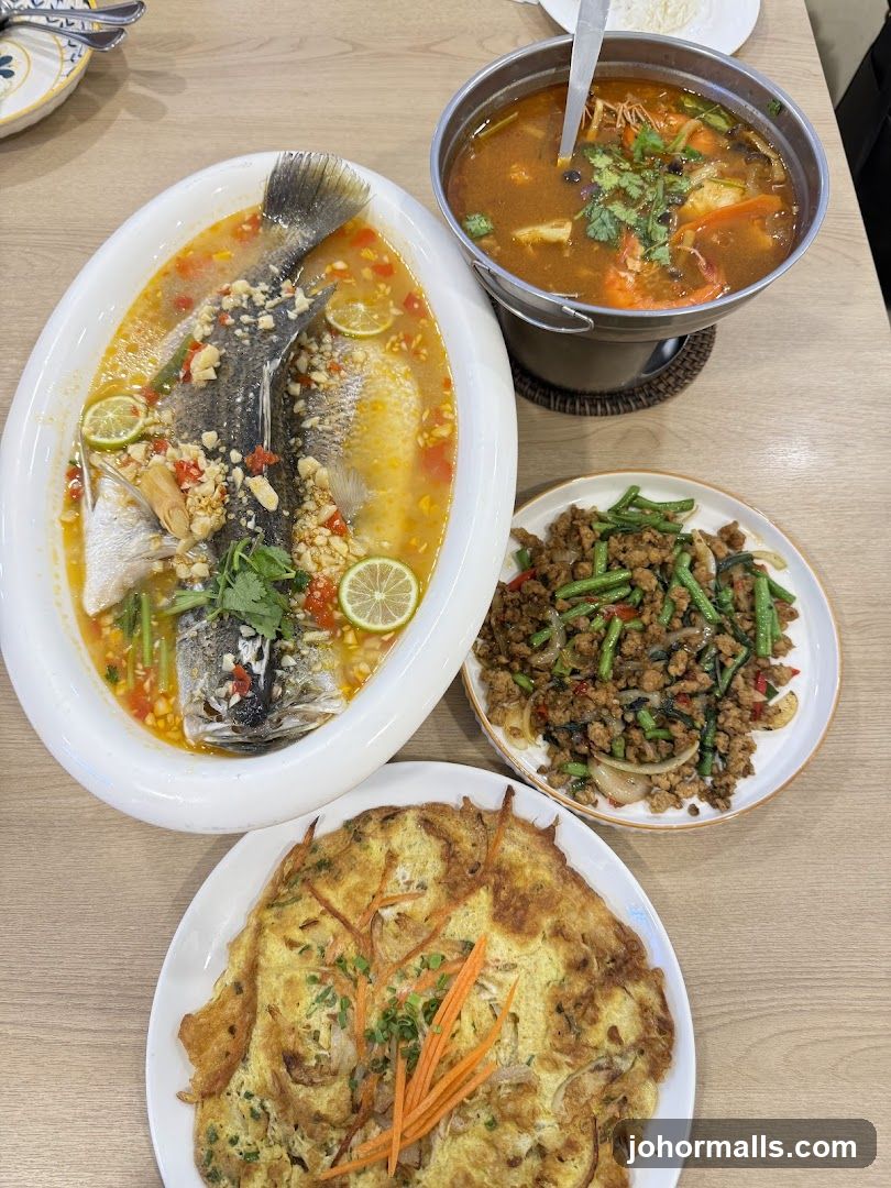 Table with Thai dishes