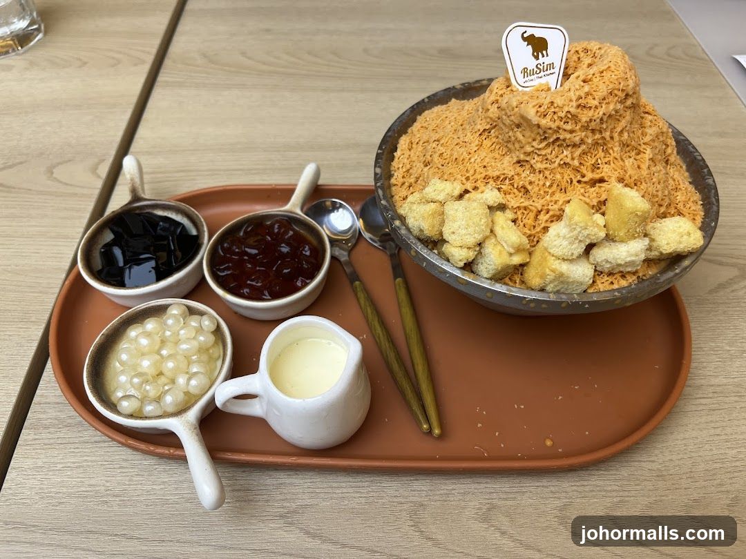 Bowl of shaved ice dessert with toppings and condiments