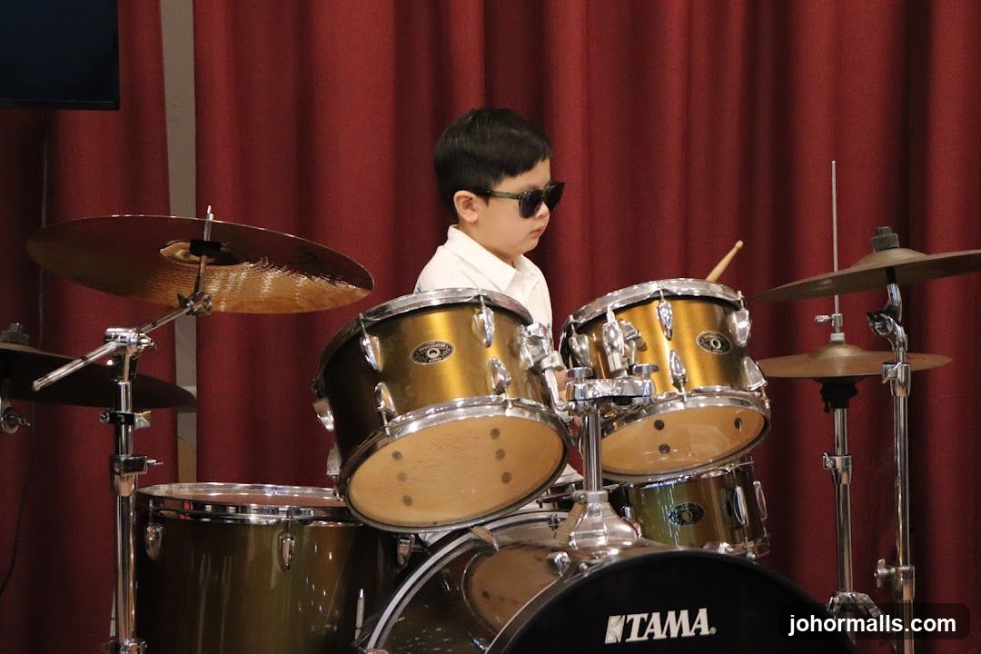 Child playing drums