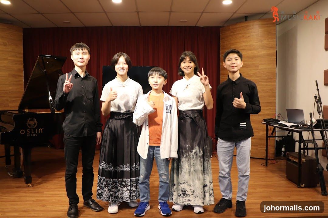 Group photo in music studio