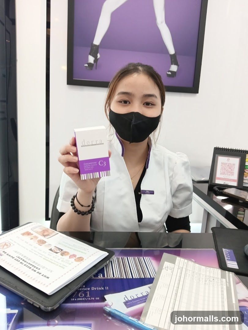 Staff Member Holding Product