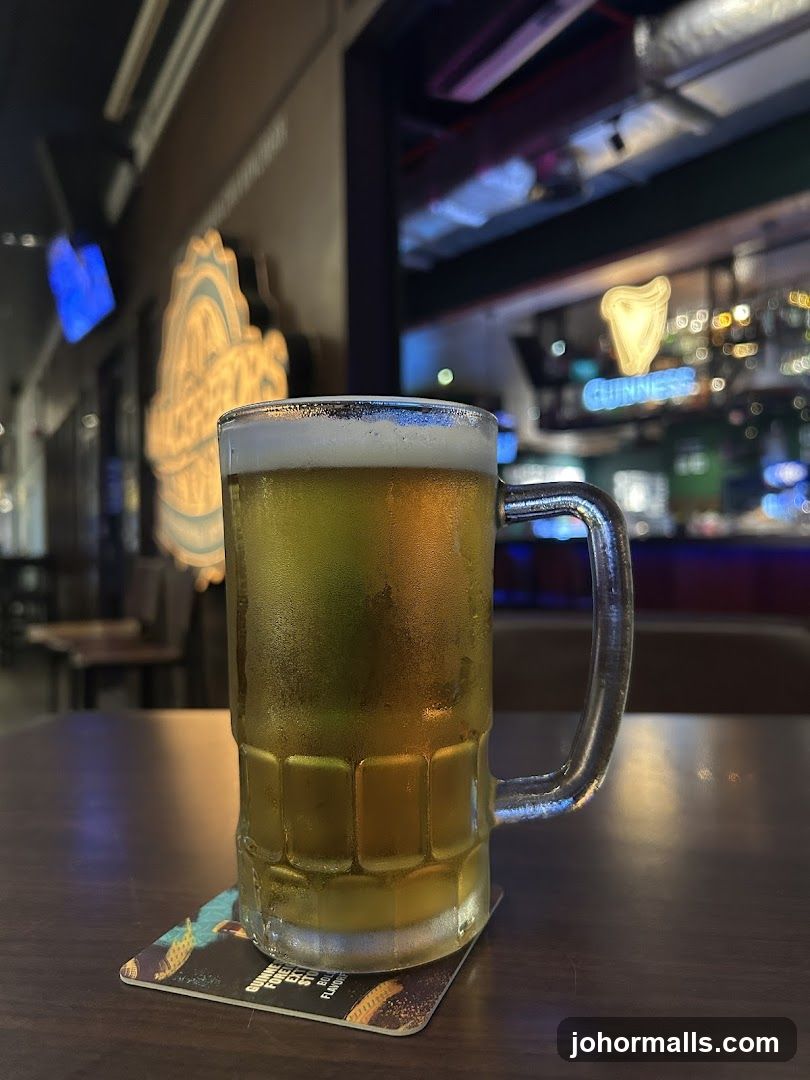 Beer mug on table in bar interior