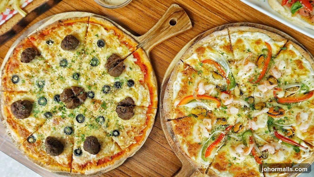 Pizzas on wooden boards