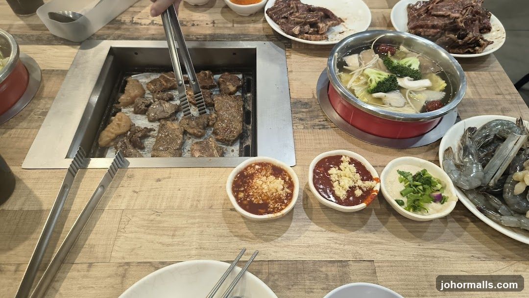 Table with BBQ Grill and Dishes
