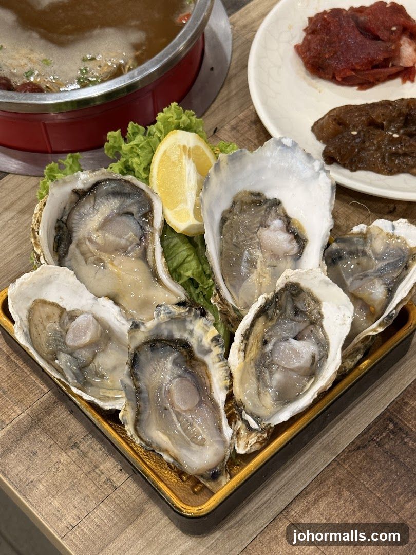 Oyster Plate with Lemon and Hot Pot