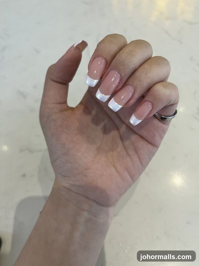 Hand with French manicure