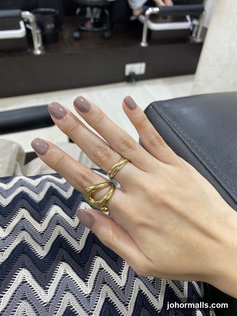 Hand with nails and rings