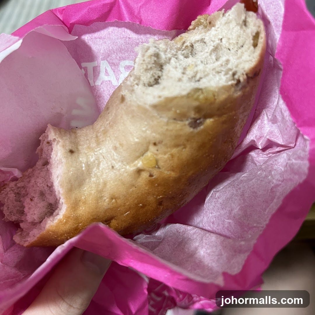 Bread in pink paper wrapper