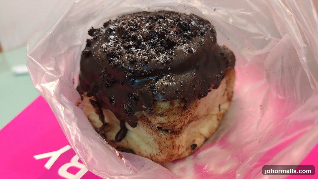 Chocolate-covered pastry in plastic bag