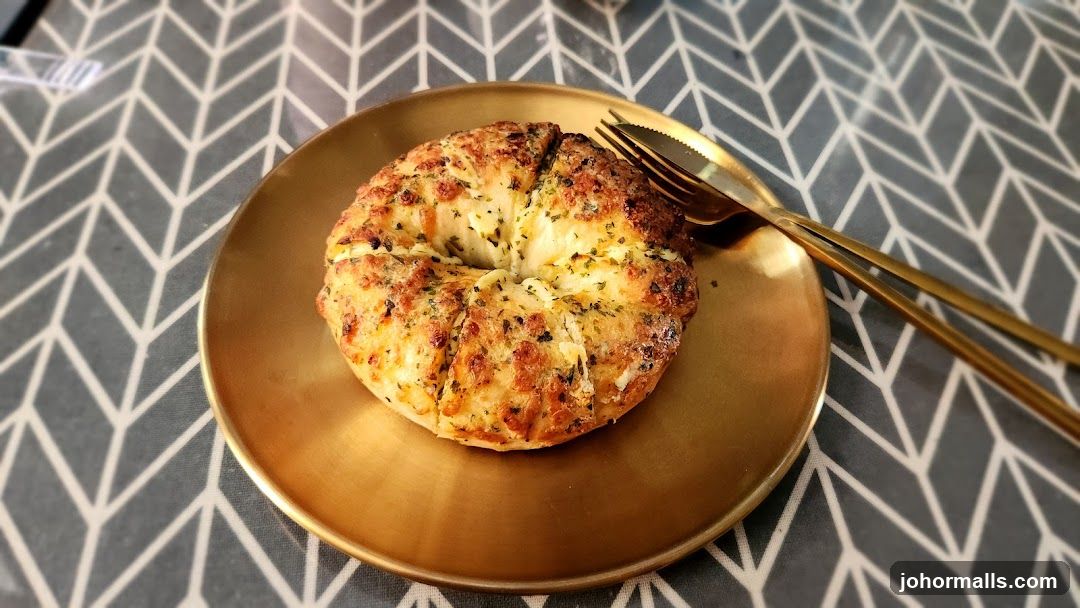 Baked Garlic Bread on Gold Plate