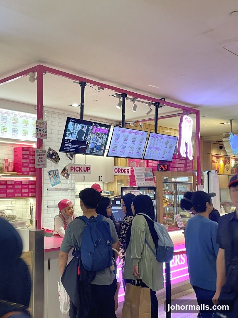 Inside a food stall with customers waiting