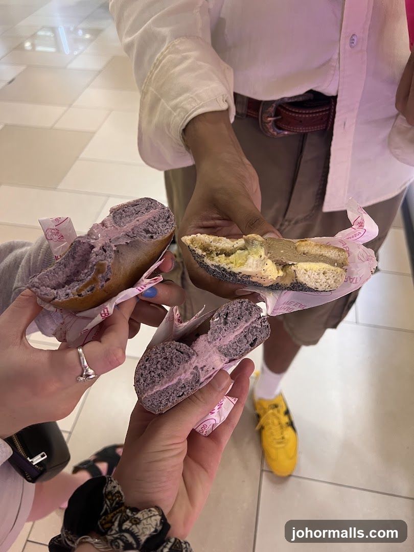 People holding bagels