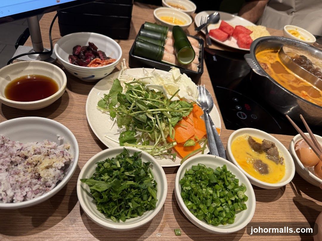 Dining Table with Hot Pot and Ingredients