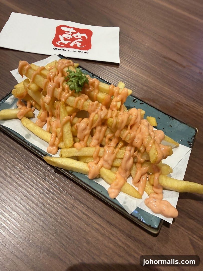 Fries with sauce on plate