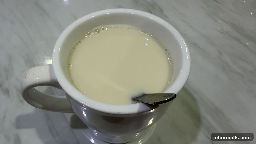 Cup of Beverage on Marble Surface