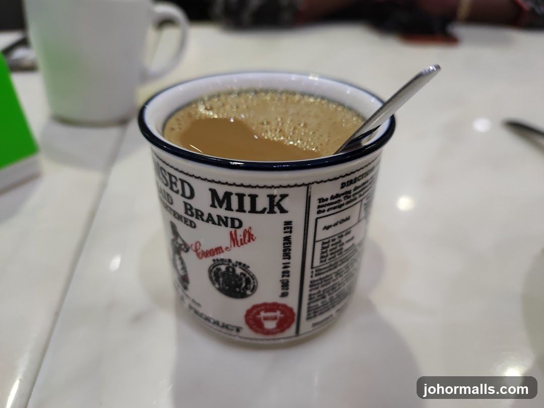 Cup of beverage on table
