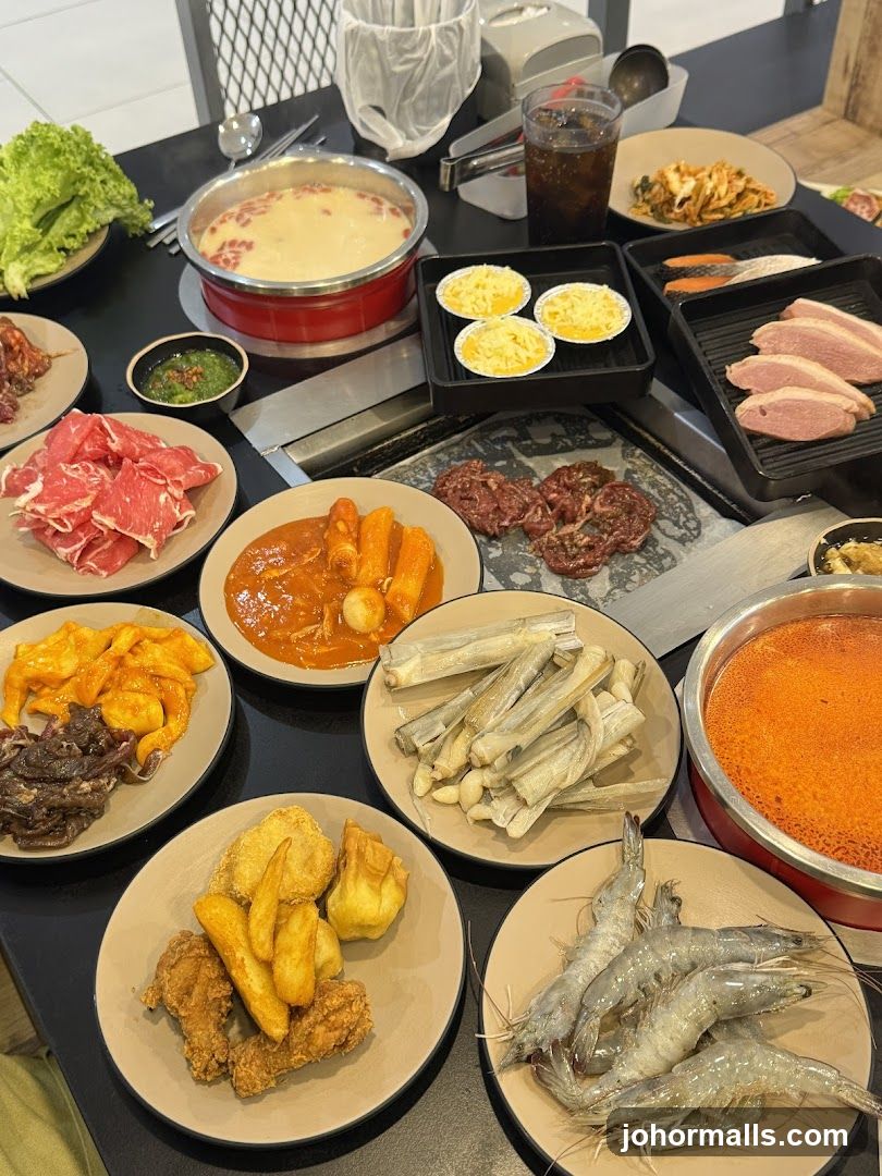 Table with Korean-style barbecue dishes