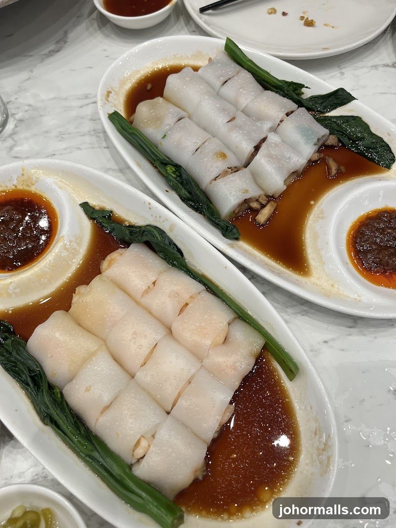 Dumplings and greens served with sauce