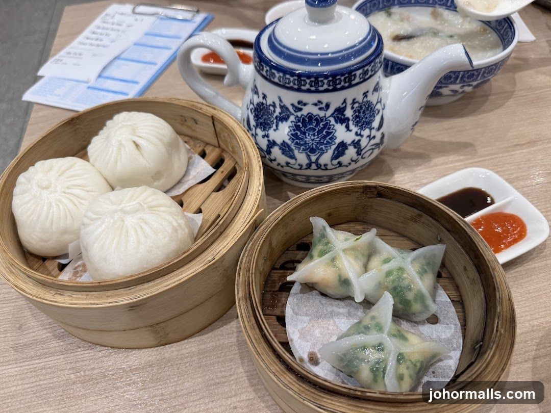 Dumplings and Teapot on Table