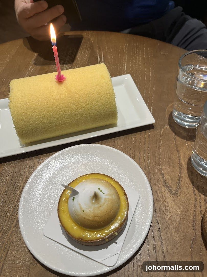 Table with desserts and water glasses
