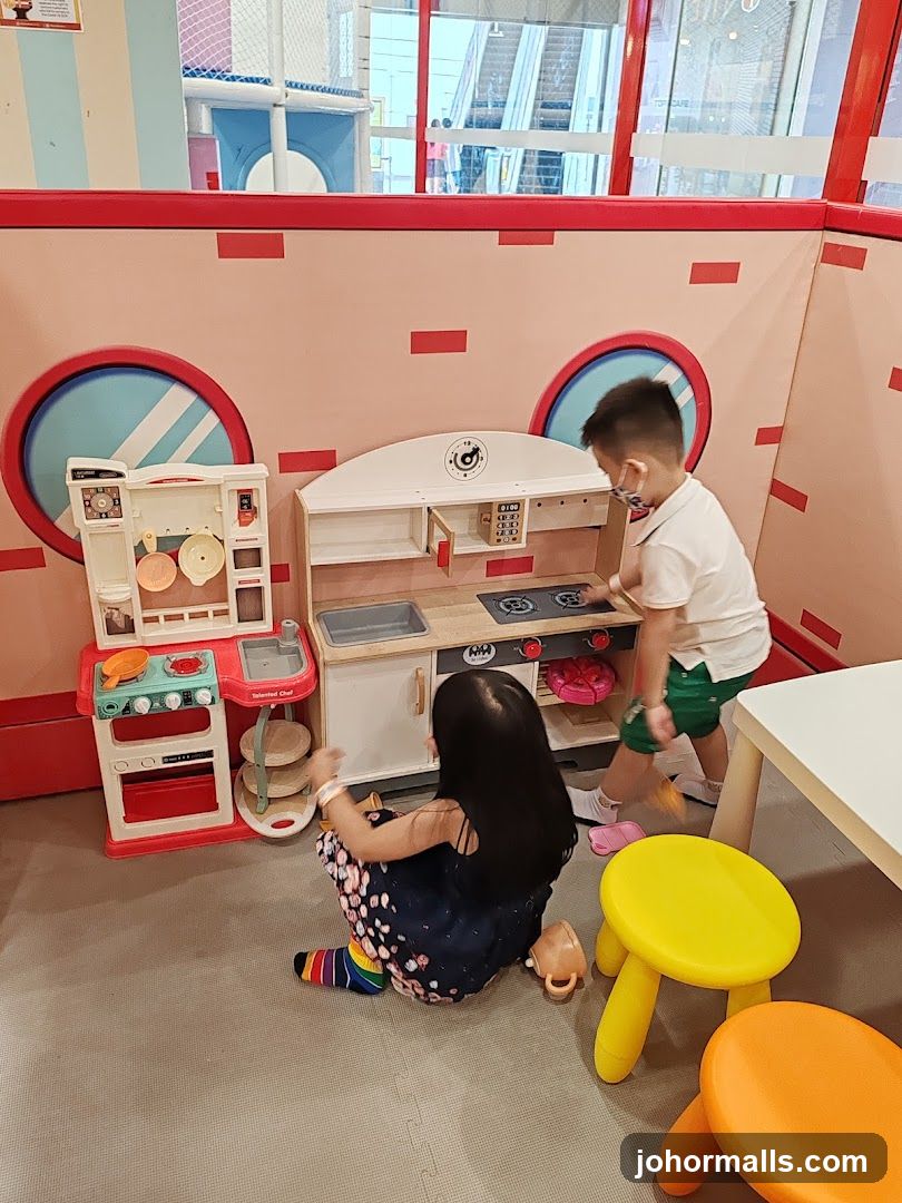 Children playing in indoor play area
