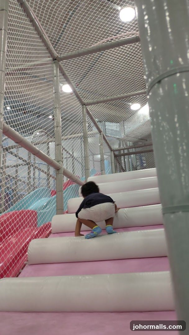 Child in indoor play area
