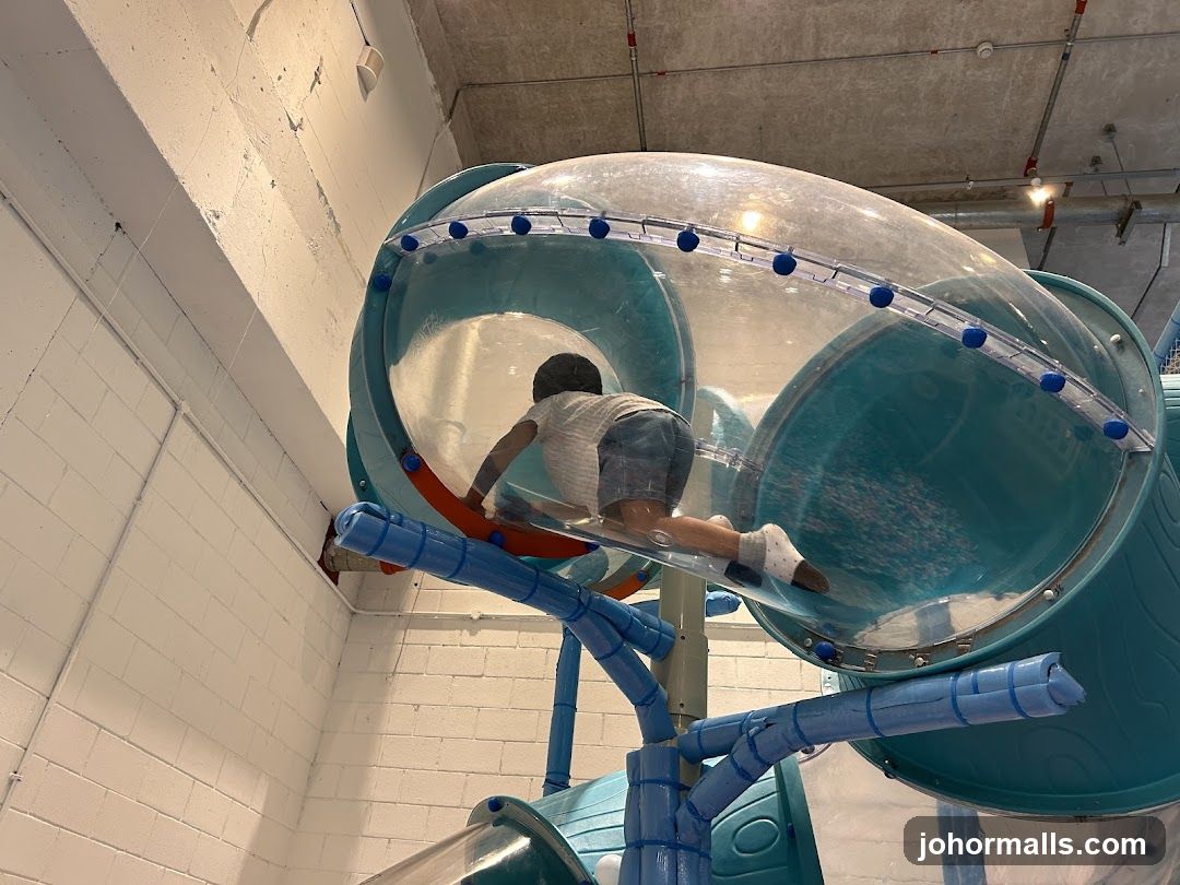 Child on indoor play structure