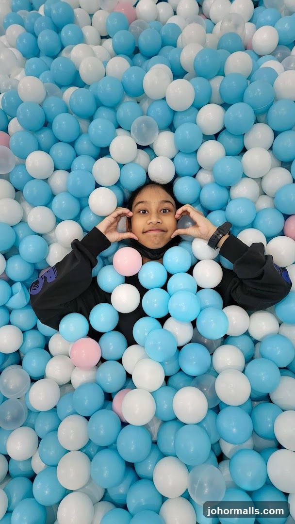 Child in ball pit