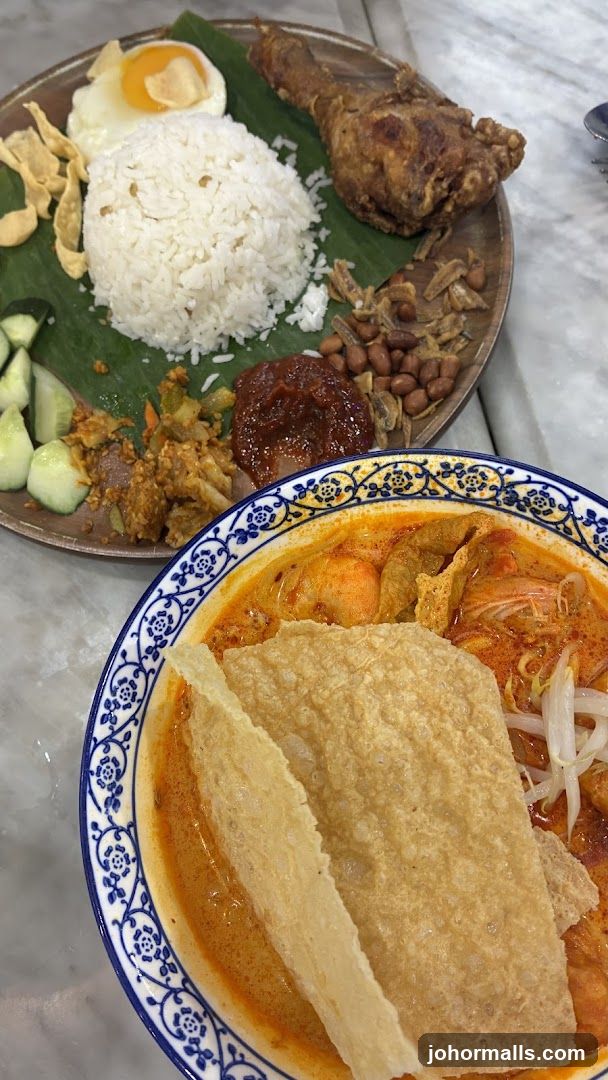 Food served on banana leaf and in bowl