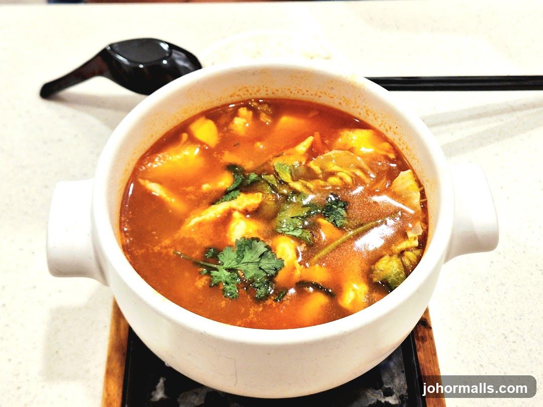 Hot Pot Soup in White Ceramic Bowl