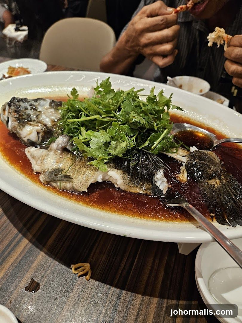 Dining Scene with Steamed Fish