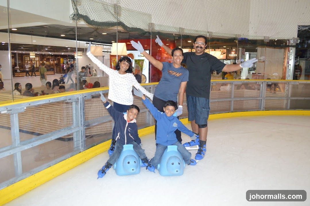 Family at Indoor Ice Rink