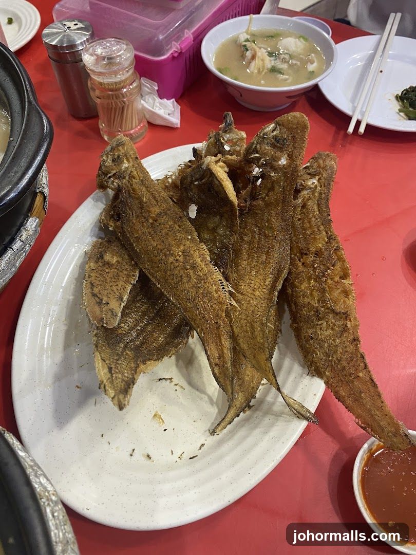 Table with Fried Fish Dish