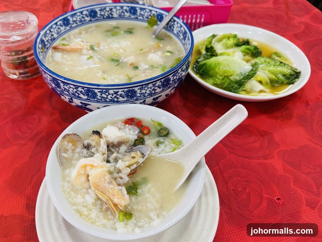 Dining Table with Seafood Porridge and Vegetables