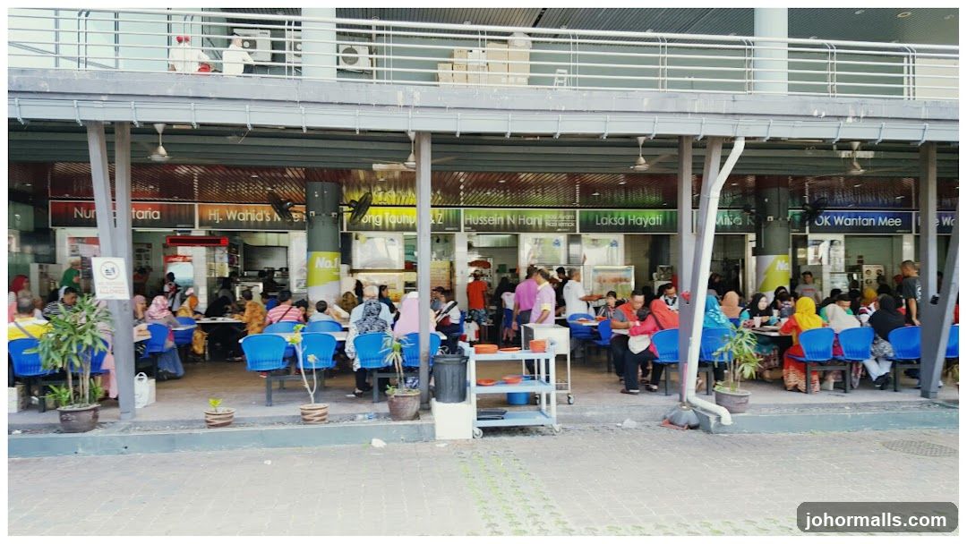 Outdoor food court with multiple stalls
