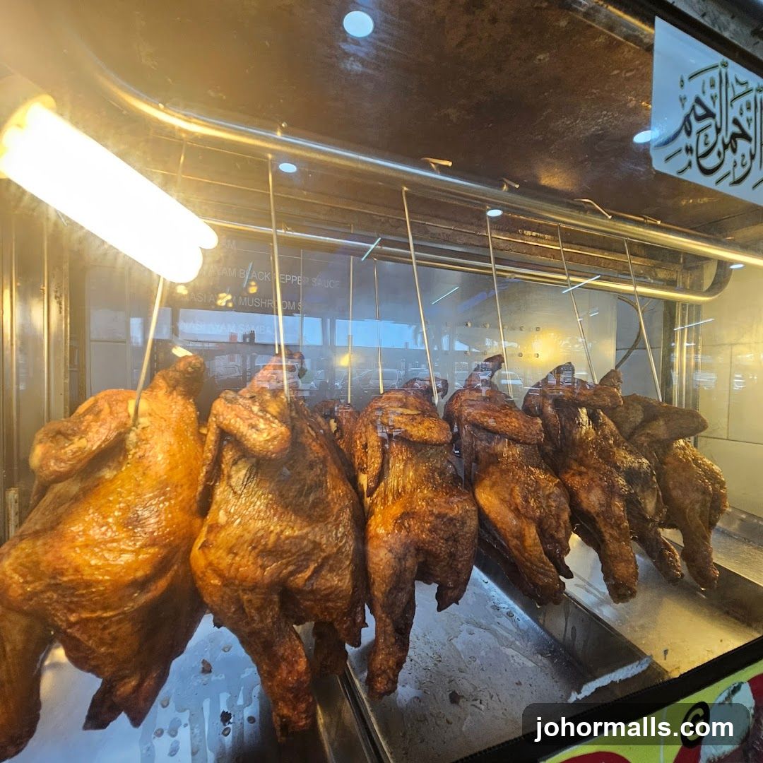 Roasted chickens in display case