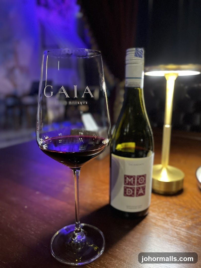 Wine Glass and Bottle on Table