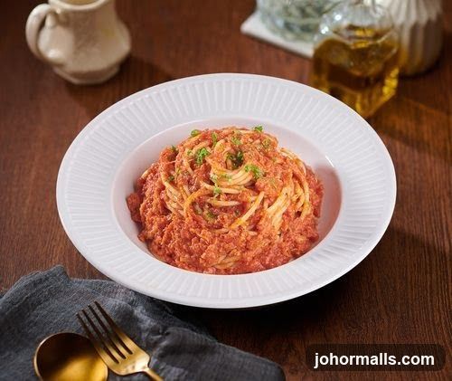 Spaghetti dish on wooden table