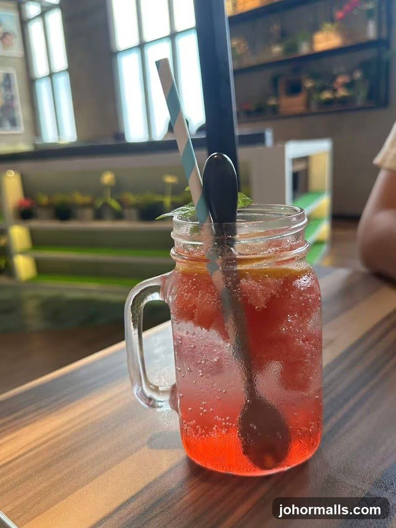 Cup of beverage in mason jar