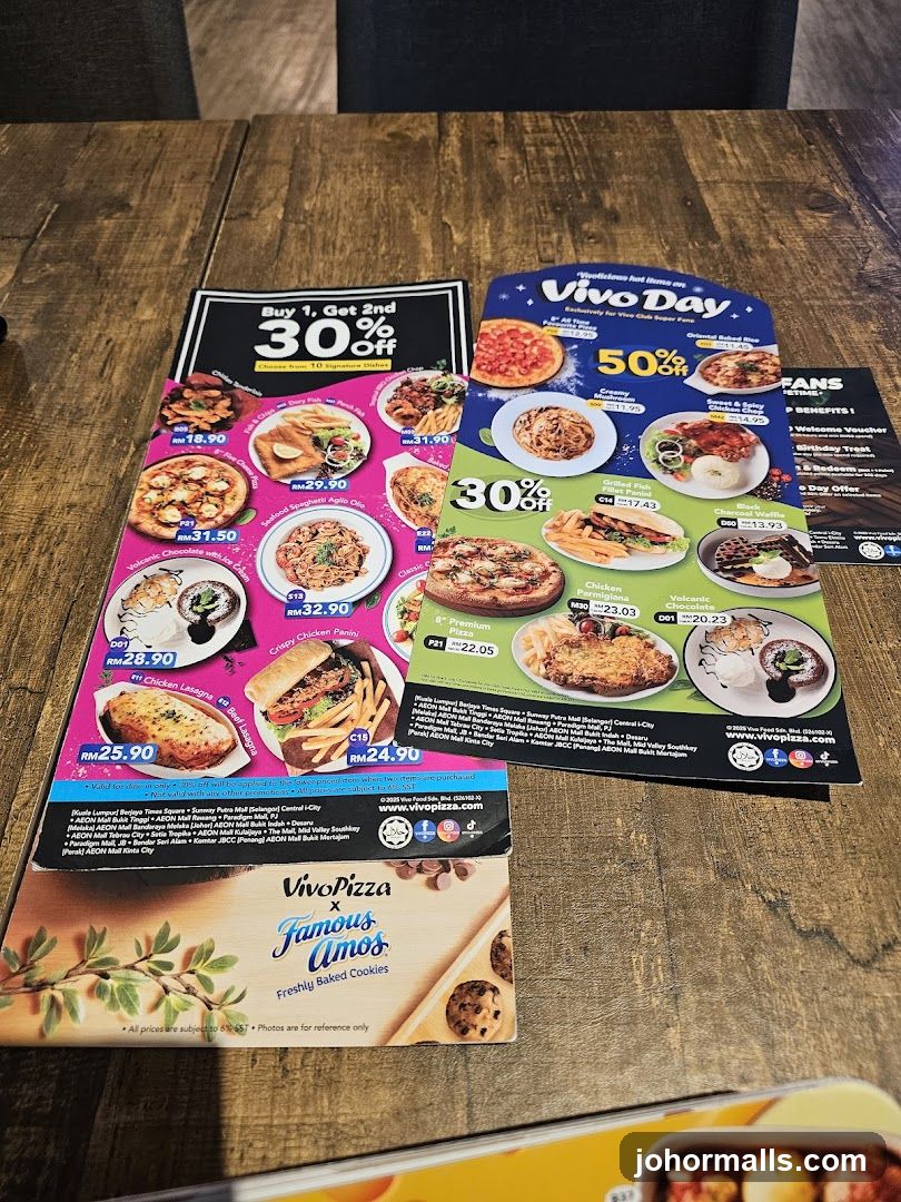 VivoPizza promotional flyers on wooden table