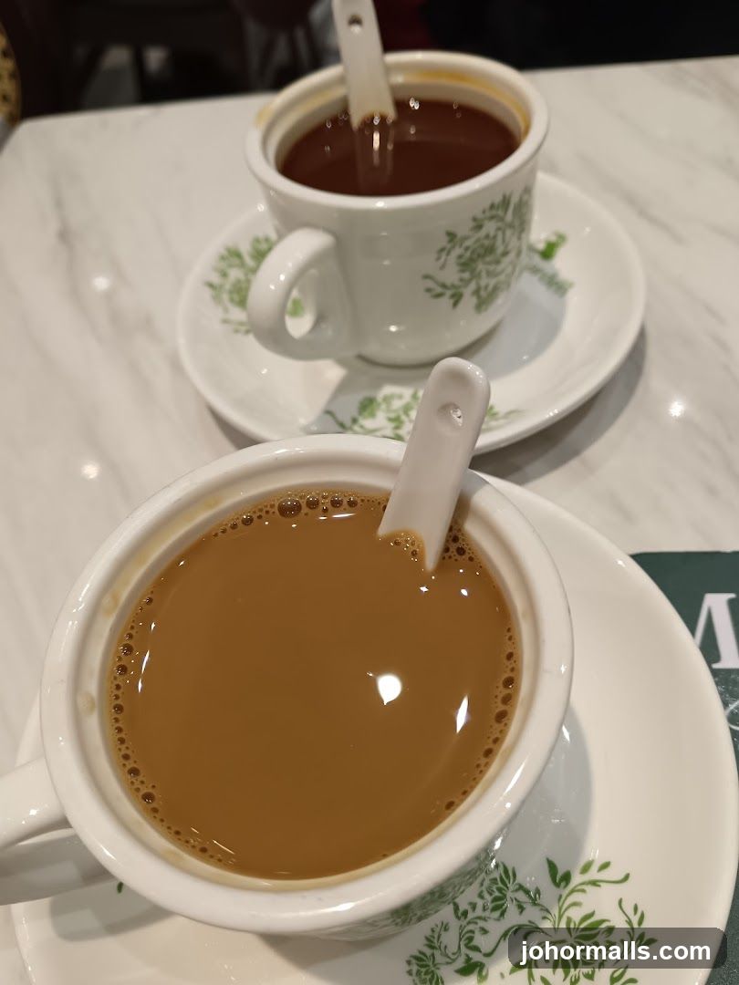 Cups of tea on table