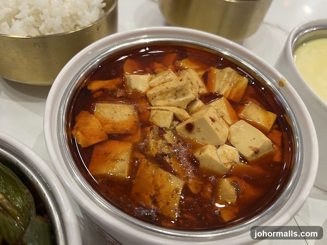 Dish of Mapo Tofu with accompaniments